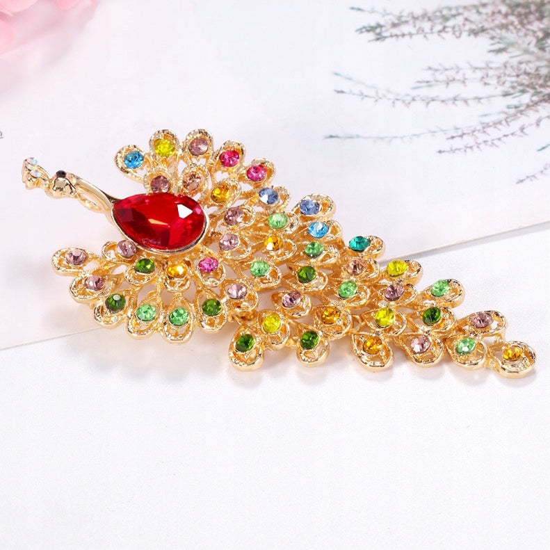 Pfau mit Zirkonen und beweglichem Schwanz – goldene Brosche