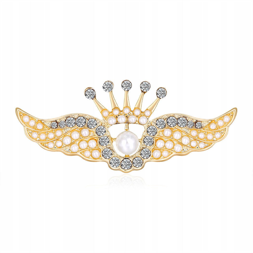 Flügel mit einer Krone - goldene Brosche mit Zirkonen und einer Perle