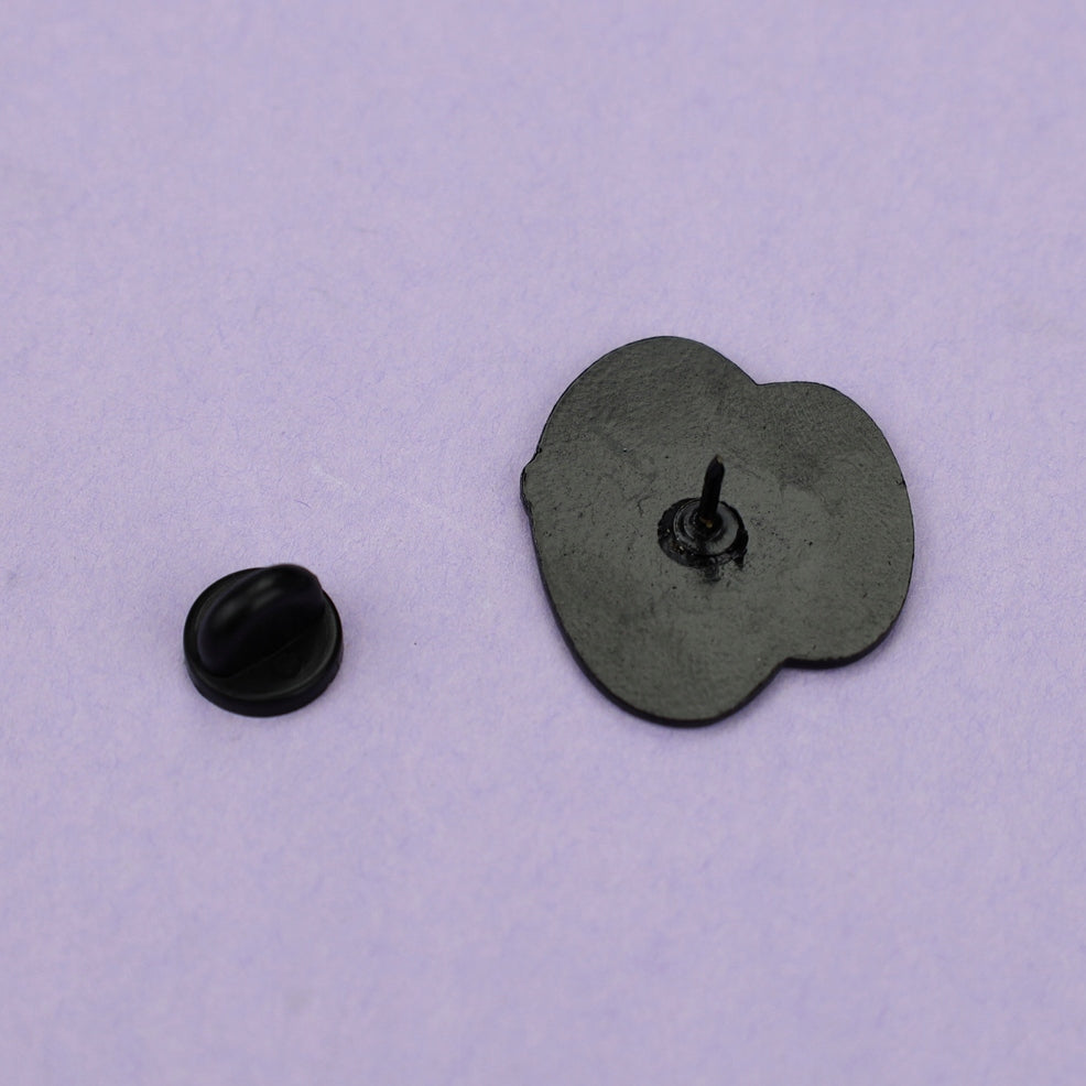 Kaffeetasse mit Kosmonauten-Anstecker