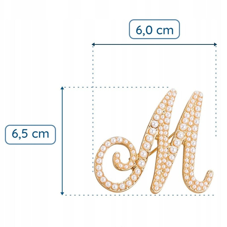 Goldene Brosche mit dem Buchstaben M und Perlen