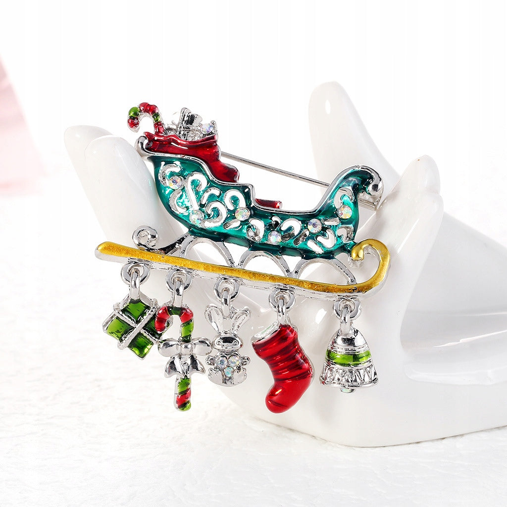 Weihnachtsmanns Schlitten mit Geschenken - Weihnachtsbrosche