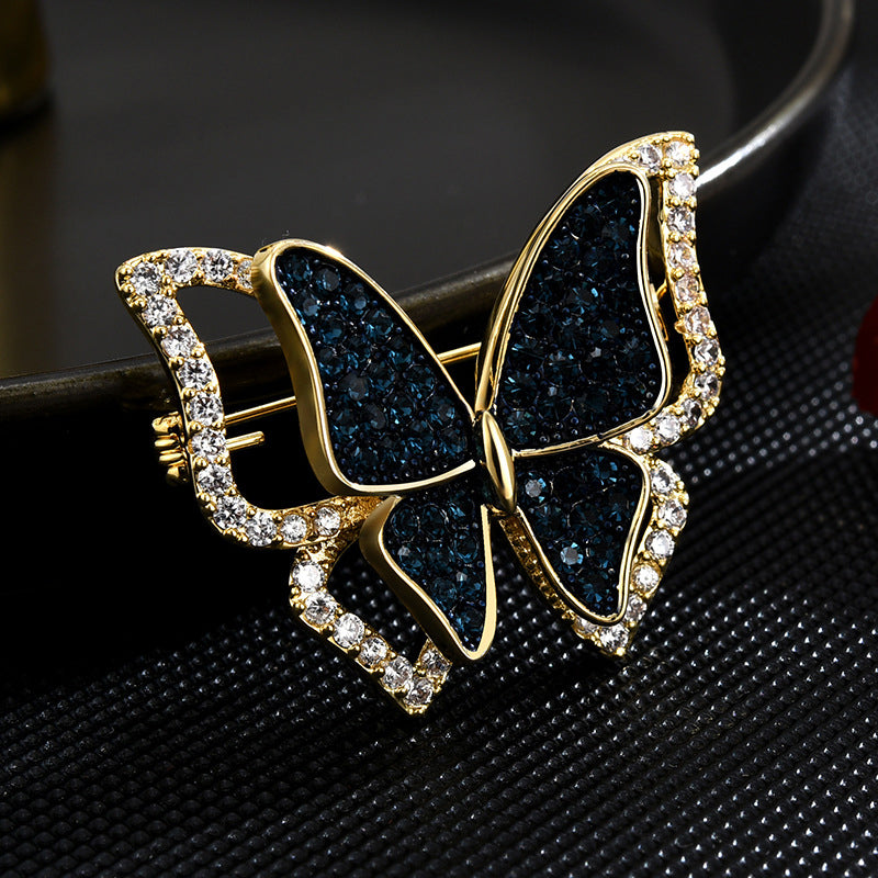 Blauer Schmetterling – 14 Karat vergoldete Brosche
