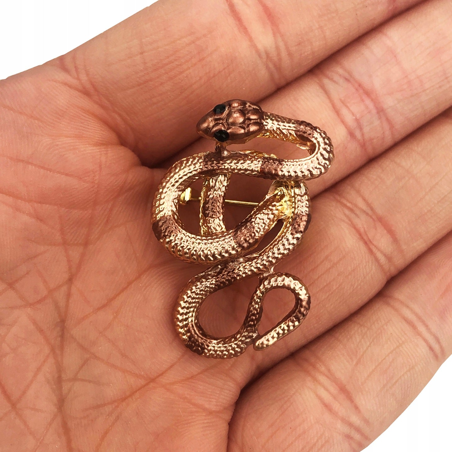 Goldene Schlangenbrosche mit Zirkonia