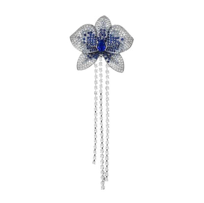 Blumenbrosche mit blauen Zirkonen und Ketten