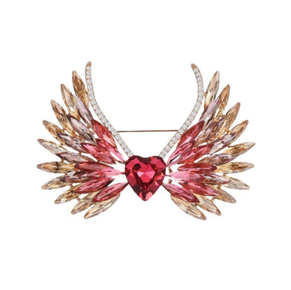 Vergoldete Herzbrosche mit Flügeln