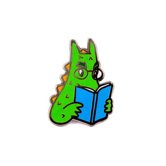 Der Wawel-Drache liest ein Buch - ein Anstecker für einen Buchliebhaber