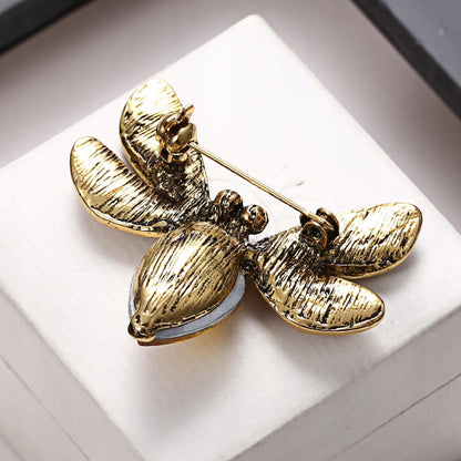Gelbe Insektenbrosche mit Zirkonia