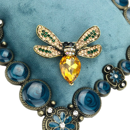 Gelbe Insektenbrosche mit Zirkonia