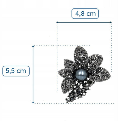 Schwarze Blume mit Perlenbrosche