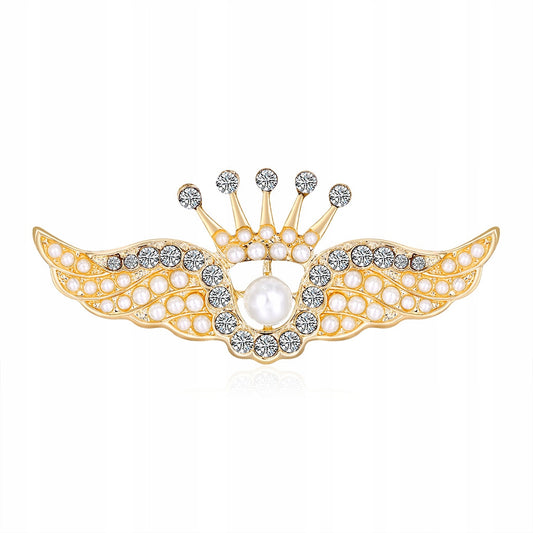 Flügel mit einer Krone - goldene Brosche mit Zirkonen und einer Perle