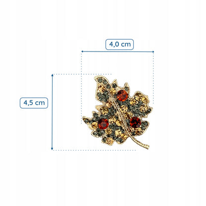 Blattgold mit Zirkonia-Brosche