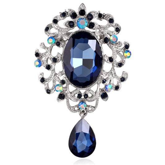 Barocke Brosche mit blauen Zirkonen