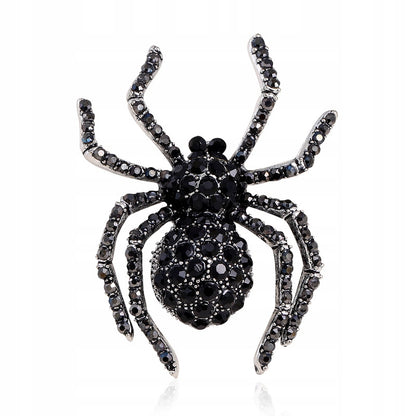 Schwarze Spinnenbrosche mit Zirkonia